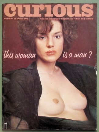 Vintage Curious magazine cover showing a topless woman with the caption 'this woman is a man?'