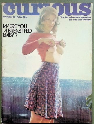 Magazine cover for 'Curious' featuring a woman lifting her red sweater to reveal her midriff and breasts; headline reads 'WERE YOU A BREASTFED BABY?'
